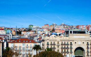 aerial view of buildings with only the sky and the roofs visible